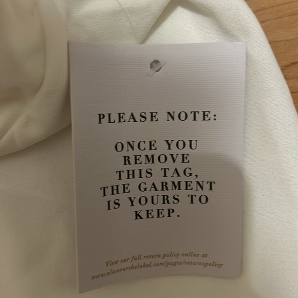 Brand new white halter gown with tie in back . Zipper in back with - Picture 9 of 15